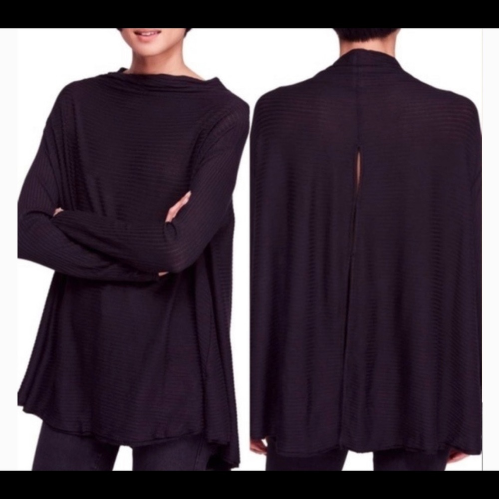 Soft Free People, ribbed, split open back in a light heather gray.